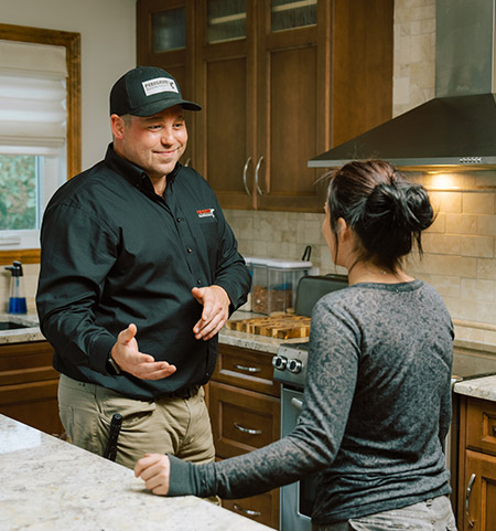 Team member greeting customer